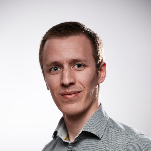 man in gray button up shirt